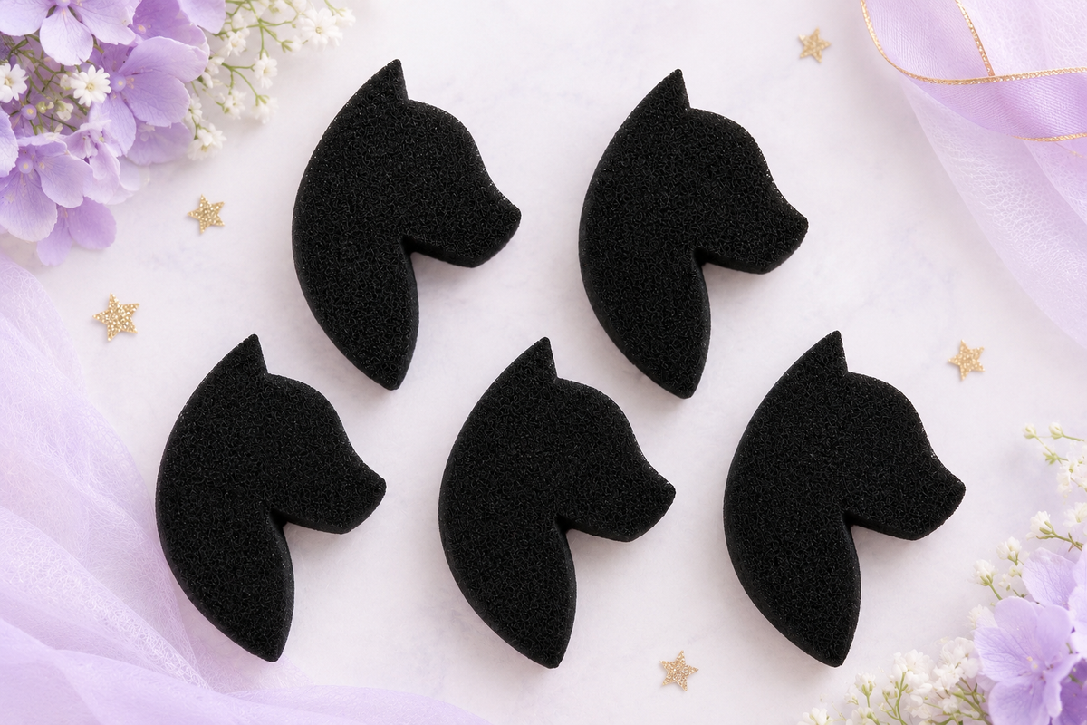 Five black unicorn sponges